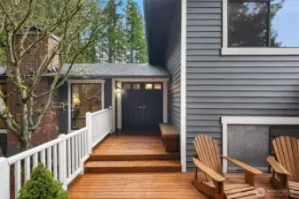 A lovely front deck & double-door entry welcome you home.