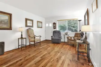Unit 410 living room.  Custom hardwood floors.