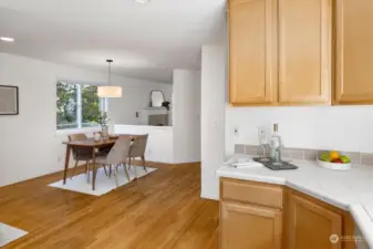 Kitchen opens to dining area