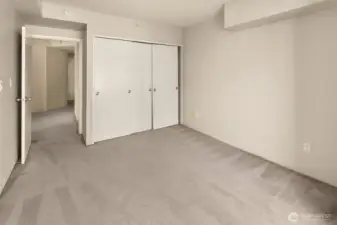 Guest bedroom looking towards the closet.