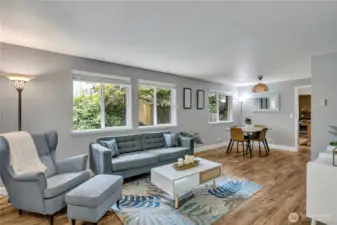 Open and flowing floor plan. Stylish vinyl plank flooring is thoughout the home - no carpet here.
