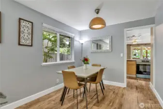Dining section of the combined living room/ dining room conveniently located by the kitchen.