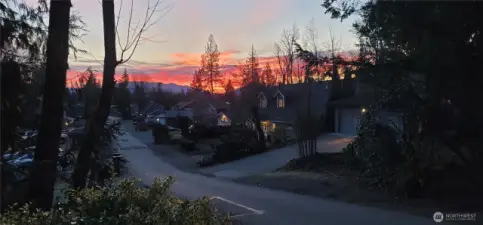 Beautiful sunrise view of SE 271st Street from in front of the home.