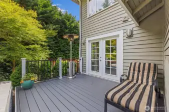 Additional deck space off the French doors from the family room.