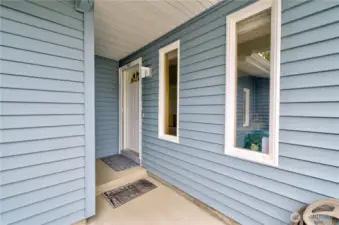 East facing covered entry keeps you and your guests out of the elements.