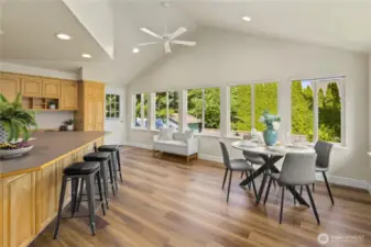 Go buy a huge Kitchen table - room for a crowd!