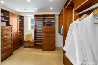 Walk-in closet plus a secondary closet with washer and dryer are all in the primary suite.