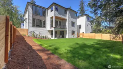 Very leveled and usable fully-fenced backyard!