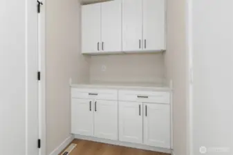 First floor laundry room cabinets and folding counter