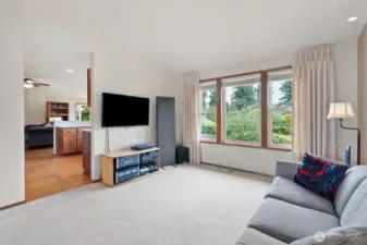 View from dining space into the kitchen and its beautiful real hardwood floors.