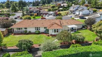 Arial View of the back of the home and the stunning back yard.