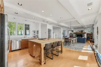 The open concept kitchen is an entertainer’s dream with access to the deck outside and open to the dining and living areas.