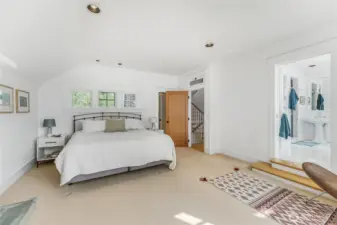 The primary bedroom is complete with Juliet balcony, walk-in closet, 5 piece ensuite and gas fireplace.
