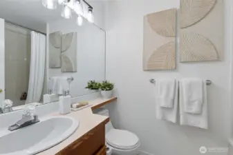 Full bathroom with brand new modern lighting.