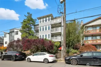 This boutique condo sits on a wide street centrally located to all things Ballard!