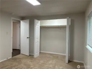 Walk in closet with lighting
