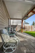 Covered heated patio and private fenced back yard that boarders a community greenbelt and park.