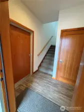 Common interior entry. Mechanical room and two lower studios accessed from this space.