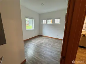 Lower 1 bedroom adjacent to kitchen/living area.