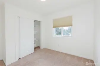 Bedroom #3. Custom closet shelving.