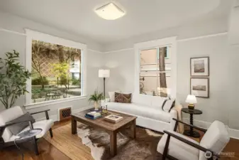 Looking out to the peaceful patio- huge windows throughout letting in light all day!