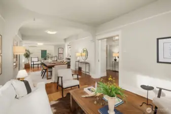 High ceilings throughout- another perpective towards the entry and another entrance to the kitchen