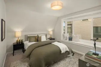 This room has been used as the primary- with a window seat for morning coffee or to relax with your favorite book