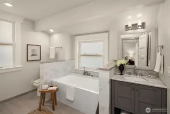 Large full bathroom servicing the upstairs with entrance from the Primary bedroom or the hallway