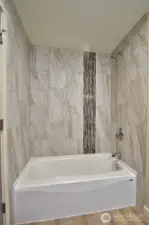Beautifully updated bathtub in the hall bathroom