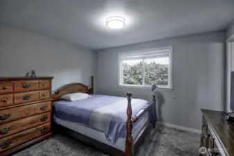Primary bedroom at the end of the hall on the right across bedroom 2