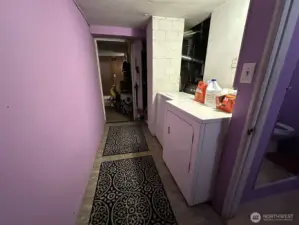 Downstairs Laundry and Utility Space From Downstairs Exit Door.