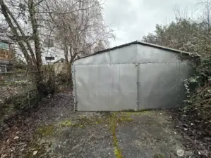 Garage on "extended lot" purchased from neighbors.  All part of our lot, now.