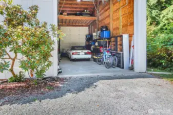 Side Garage Door opened to view the Interior Parking Area
