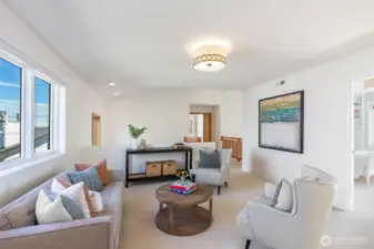 Flex space upstairs could be a play area, office or media space