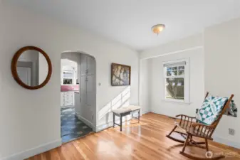 Versatile Office/Den: This bright main-floor room features warm hardwood floors and a coved entryway. It serves perfectly as a quiet home office, library, or hobby room.