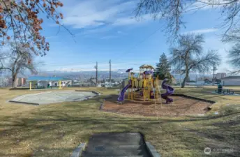 Park, just a hop, skip away.  Wading pool!