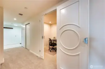 Cool new den for the ideal in-home office complete with built-in shelving & storage.