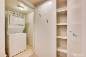 Off the den office space is the laundry conveniently tucked away.