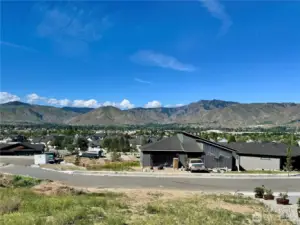 View from what would be front entryway to home. Looking out towards Wenatchee Valley and River