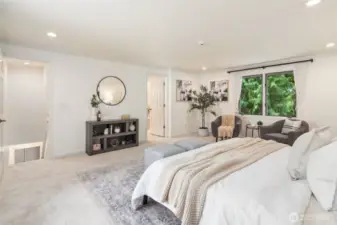 Large windows bring in natural light while maintaining privacy, creating a peaceful escape.