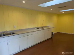 Exercise/guest space even has a sink and cooktop.
