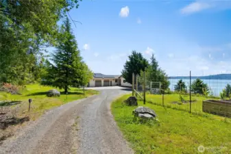 This is the driveway as you enter the property from Strawberry Point Rd.  The property is secluded and private.