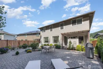 Step outside to an entertainer’s paradise with elegant pavers and BBQ hookups.