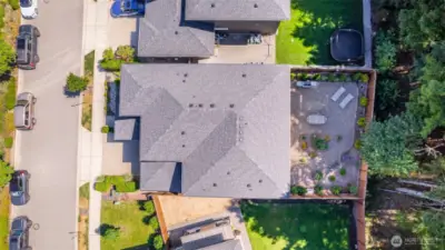 Stunning aerial view showcasing the full expanse and beauty of the property backing to a protected greenbelt lot.