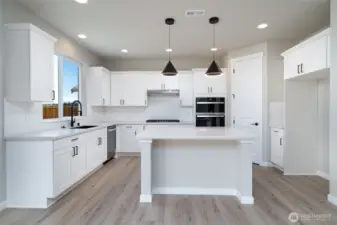 Photos are of a home in a different community and are for illustration purposes only to reflect typical finishes.  May depict seller enhancements.  Colors and options may vary.