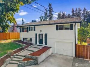 The front steps open to a stunning entry that instantly feels like home.