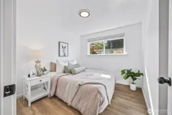 Functional and light-filled second bedroom.