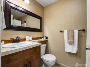 On the main floor by the staircase, youll find a 3/4 bath with walk in shower