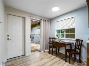 The eat in kitchen also has entrances into the garage and the back patio