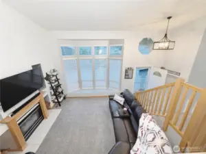 Bay windows flood the house with natural light